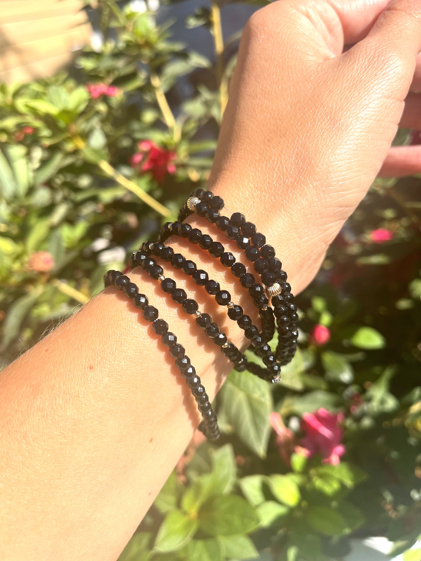 Black onyx, gold accent bracelet